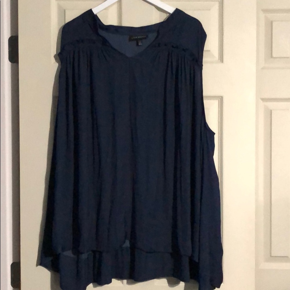 Navy sleeveless blouse. NWOT.
